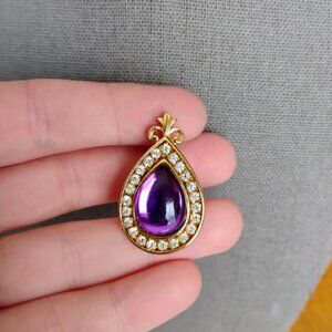 Purple stoned pendant